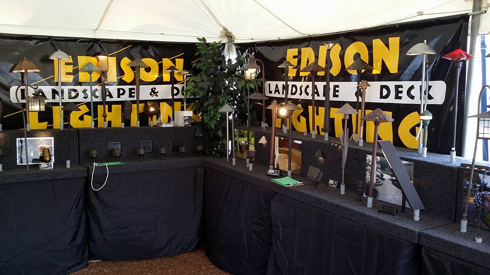 Edison light fixtures on display under tent