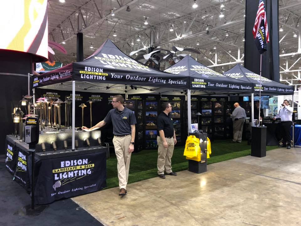 Edison lighting staff at an outdoor lighting convention